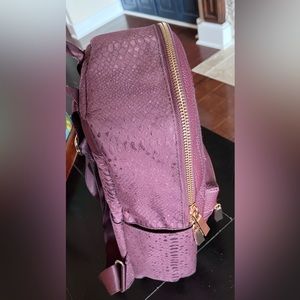 SOLD…….Vince Camuto leather trimmed backpack